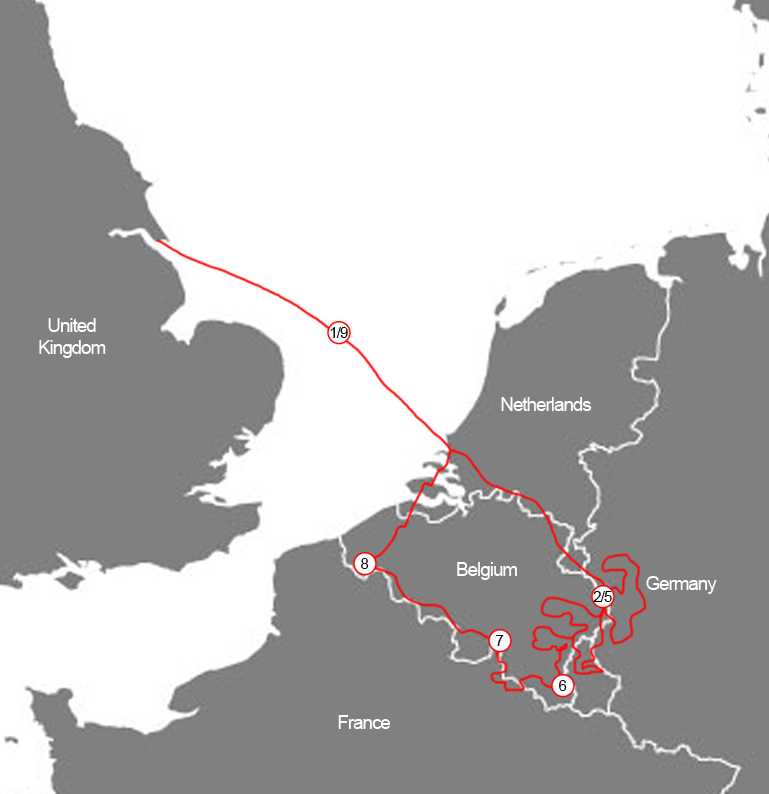 A simplified route map of North-Western Europe showing a red motorcycle tour path. The route begins in the United Kingdom, crosses the sea to the Netherlands, and loops through the Ardennes region across the borders of Belgium, Germany, Luxembourg, and France, with numbered stops from 1 to 9 indicating daily stages.